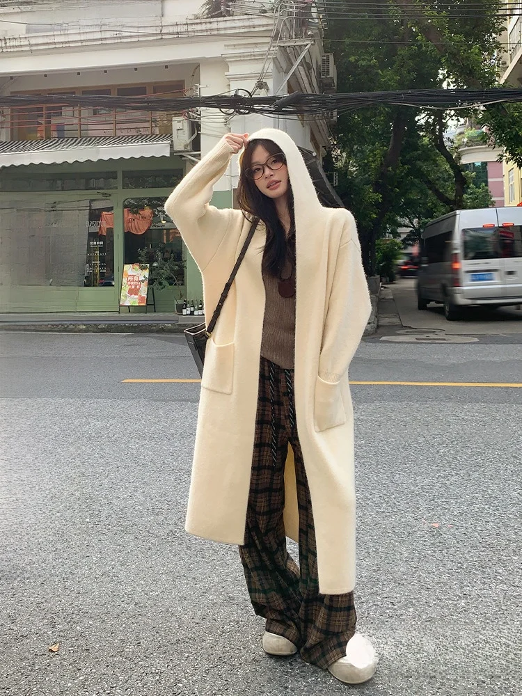 

Свободный вязаный открытый кардиган с капюшоном, женский осенне-зимний повседневный кардиган средней длины Sle Faion Top Song Zhengen абрикосового цвета