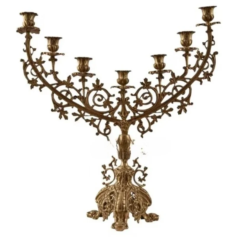 

Antique brass candle holders, intricate floral carving designs and seven arms of classic luxury home decor