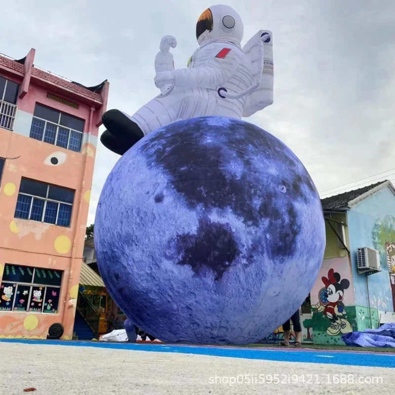 巨大なインフレータブル宇宙飛行士が月に着陸するLEDライト付きコンサート用インフレータブル月ステージ装飾インフレータブル宇宙飛行士月おもちゃ