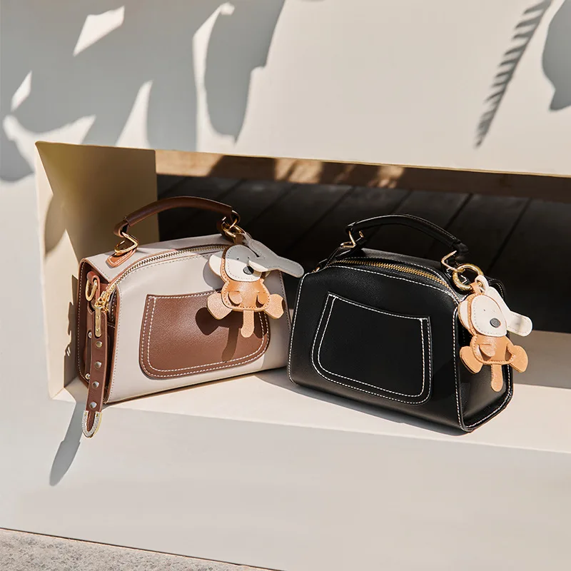 2024 new fashionable handbag with a high-end feel, light luxury, one shoulder crossbody Boston bag, pillow bag