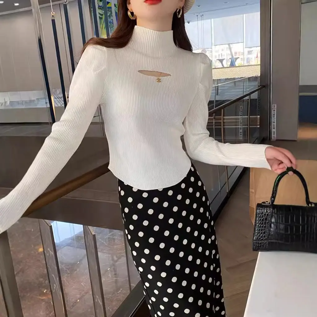 

Women's Slim Fit Half Turtleneck Knitwear with Cut out Bottom Fashionable White Top for Autumn Winter New Arrival