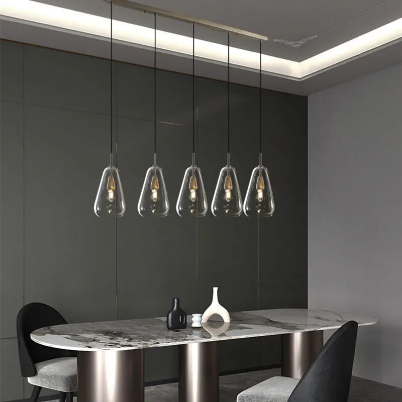 

Dining room chandelier is a long strip of modern minimalist Italian luxury Nordic minimalist designer art dining room.