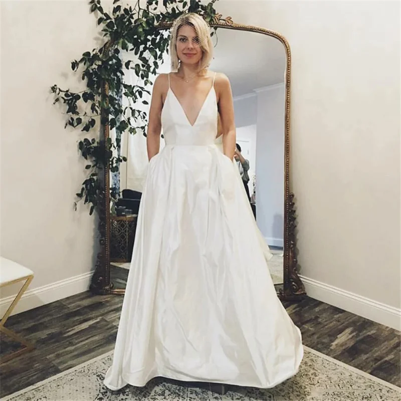 

Wholesale Spaghetti Straps Sexy V Neck White Satin Wedding Dresses 2023 with Pockets Elegant Bridal Gowns Robe De Mariee