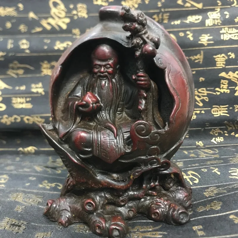 Antique-style resin crafts, including imitation peach ornaments, old peach figurines, and Buddha statues, designed to look aged