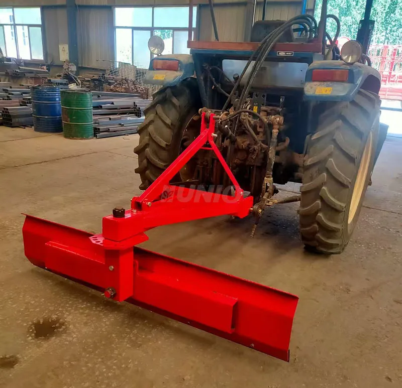 Agricultural tractor with three-point hitch link scraper, land leveling machine, grader