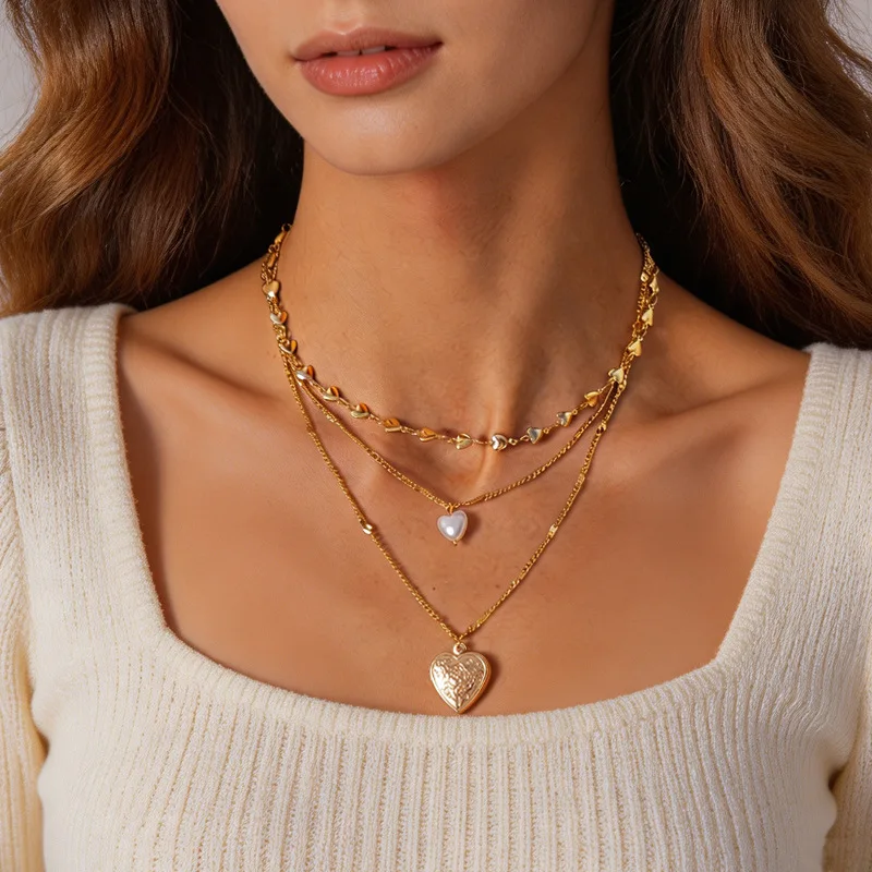 

Pearl love printing three-layer stacked sweater chain French retro niche high-end temperament necklace women