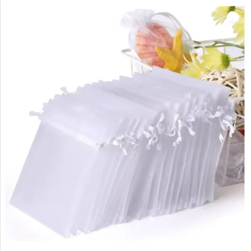 50 pçs cordão amarrado abertura jóias armazenamento saco de organza transparente cosméticos saco de presente de doces de casamento 7x9cm 9x12cm