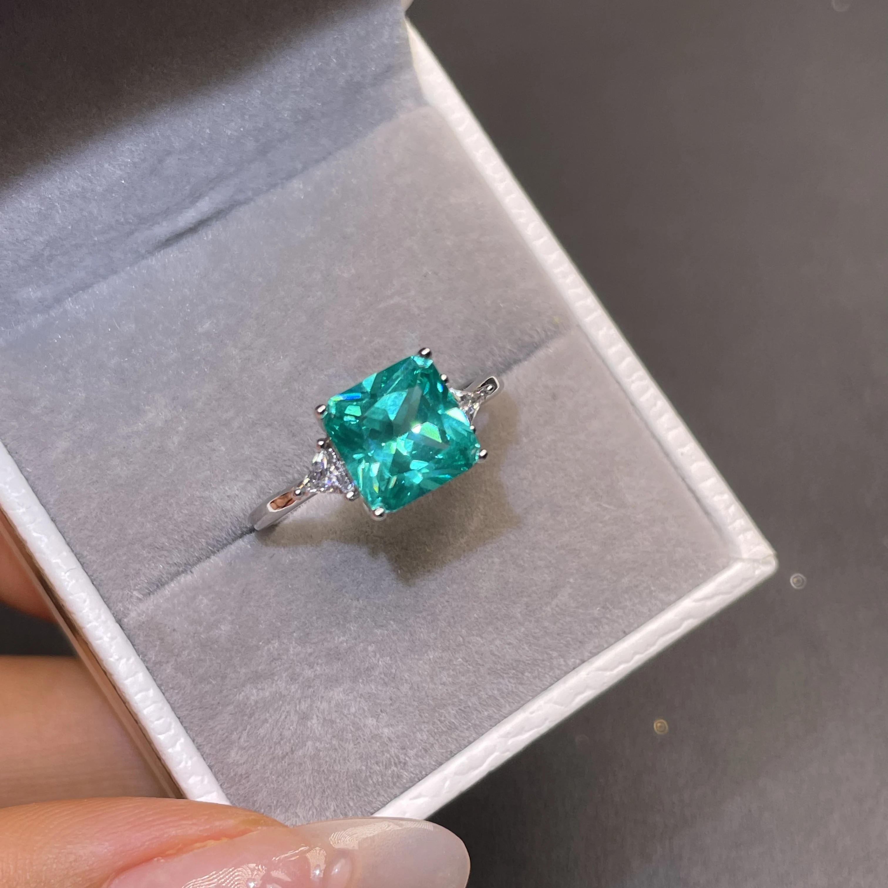 100% natural sky-blue paraiaba ring. Pure silver. Designed for women's weddings. Exquisite square-shaped high-end jewelry