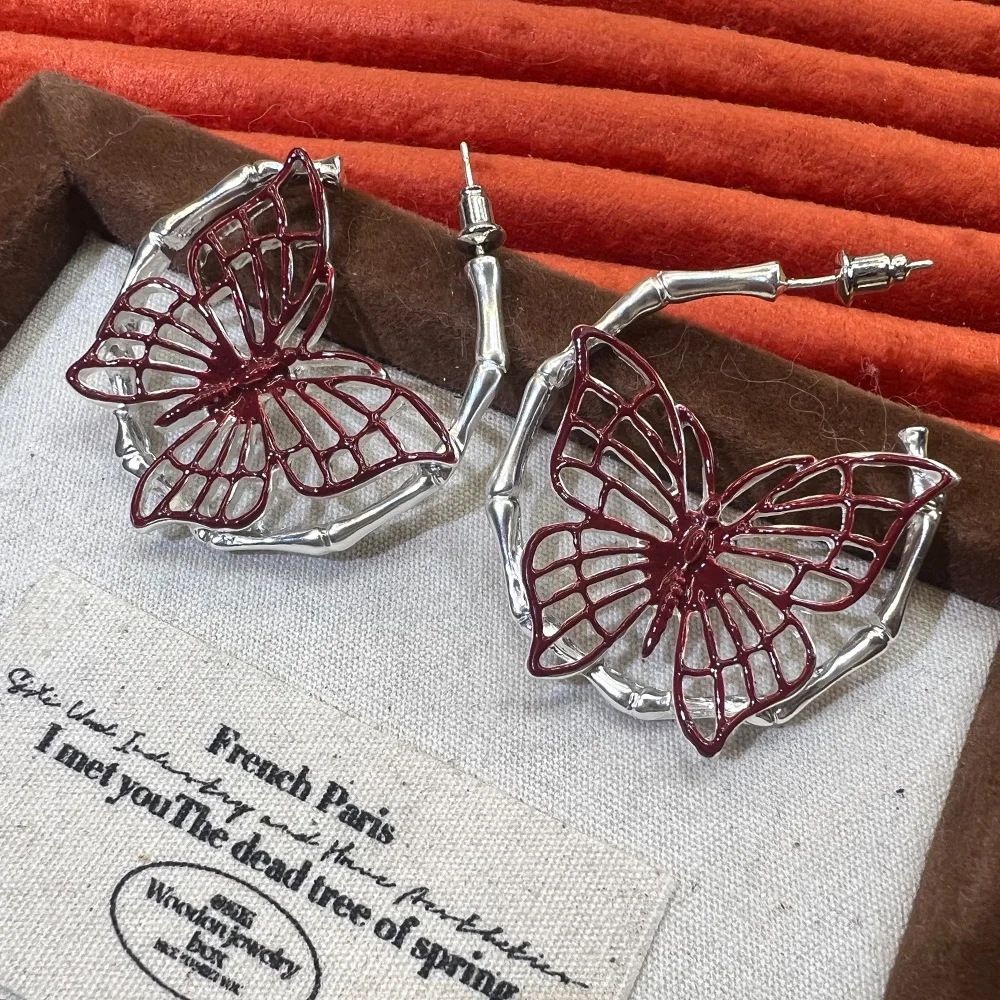 Korean hollow hand-painted enamel butterfly earrings, niche design versatile light luxury retro court style S925 earrings