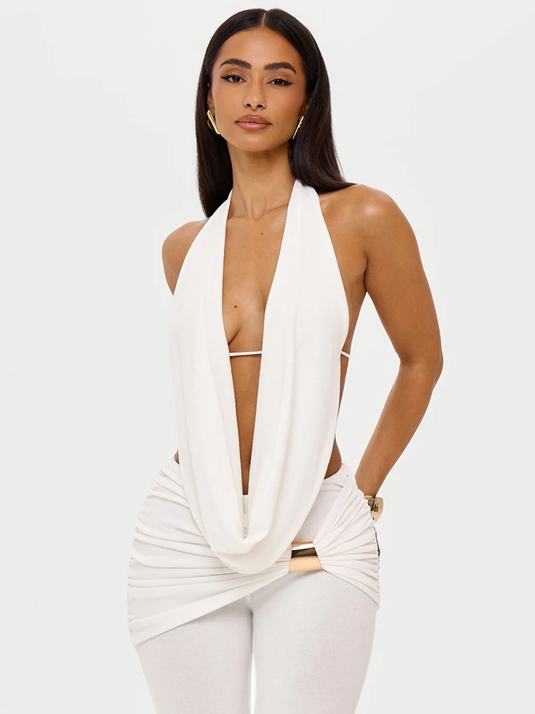 

Комплект из 2 предметов Whatiwear: женский топ-халтер без спинки + расклешенные брюки с металлическими узлами и пэчворком, летний уличный стиль