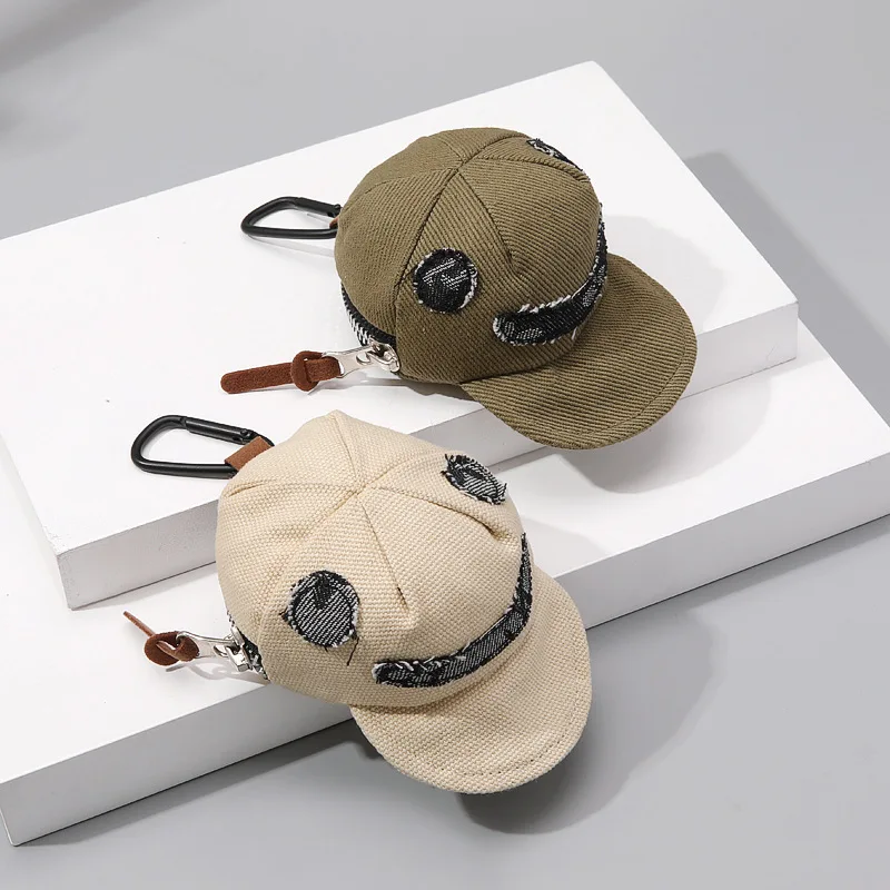 porta-moedas-em-forma-de-bone-com-um-simpatico-rosto-sorridente-pequeno-estojo-de-lona-com-fecho-e-mosquetao-bolsa-para-guardar-fones-de-ouvido-com-design-de-chapeu-chaveiro-portatil