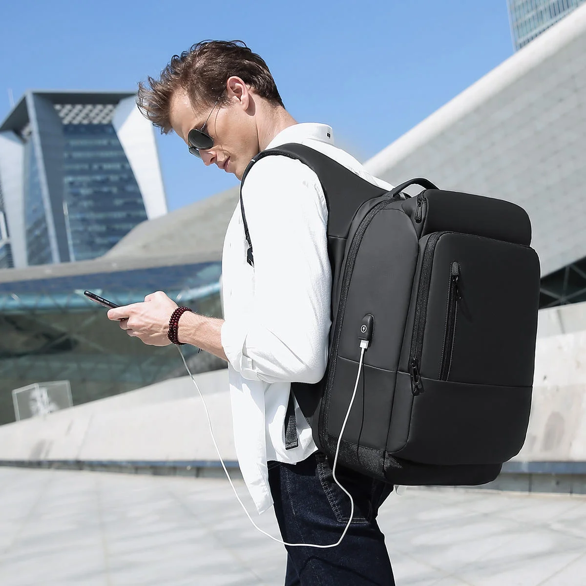 Geestock USB شحن كمبيوتر محمول للأعمال على ظهره متعددة جيوب سعة كبيرة حقيبة السفر مقاوم للماء موضة الرجال على ظهره