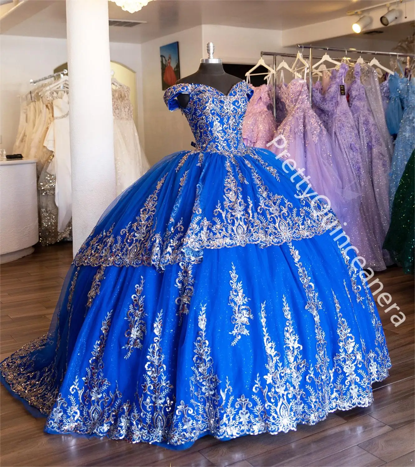 PrettyQuinceanera Two Tiered Royal Blue Short Train Quinceanera Dresses Off Shoulder Puffy Ball Gown with Gold Appliques