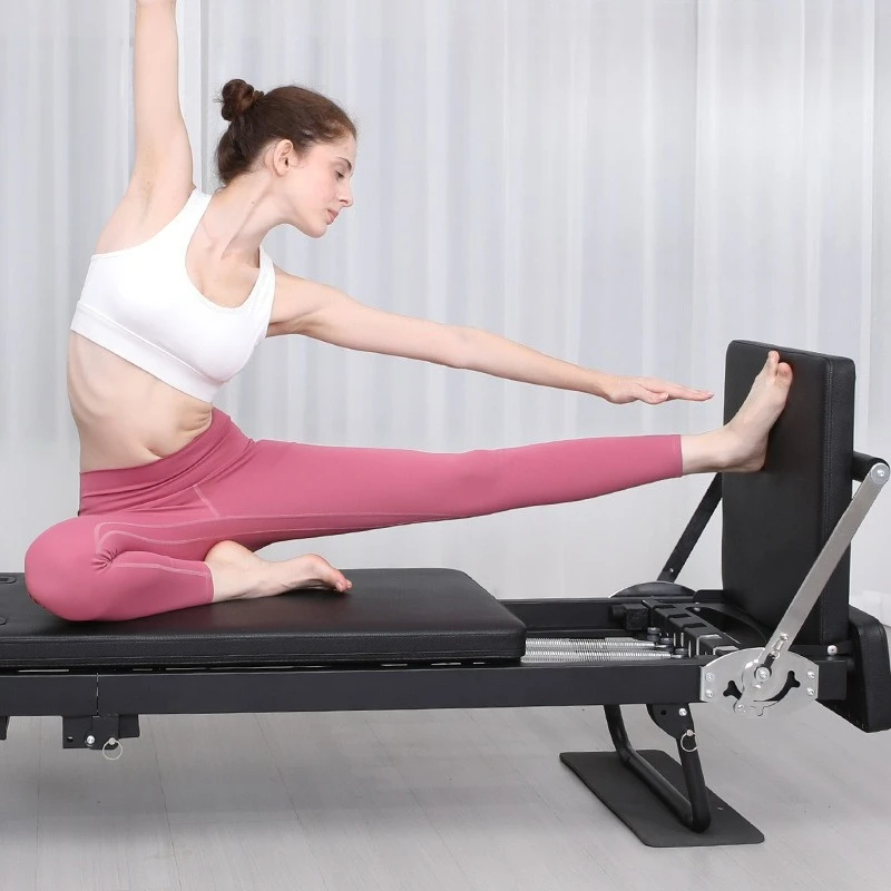 Home use extended frame folding yoga and Pilates equipment latex spring dual-use  Pilates core bed