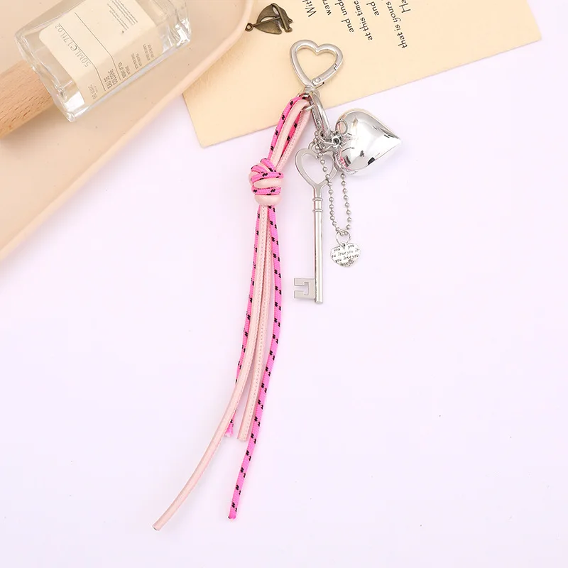 

New woven leather rope keychain pendant, bag chain accessory, camera pendant, mobile phone lanyard to prevent loss