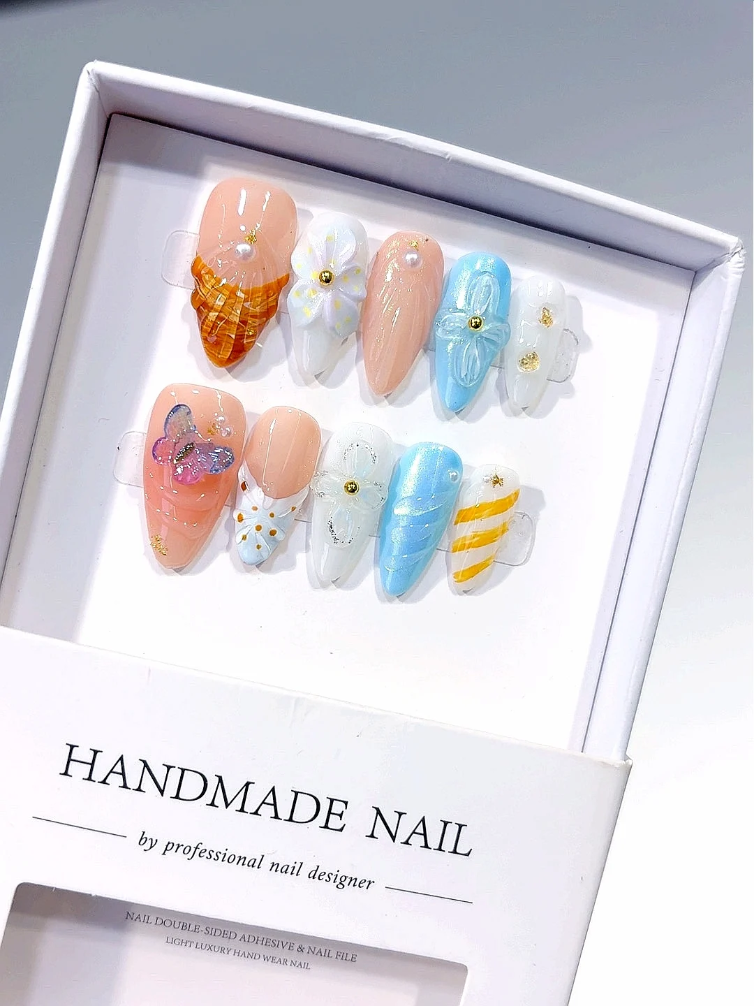 

Pastel Butterfly Floral Almond Press on Nails - 3D Pearl Rhinestone False Nails for Women（D575）