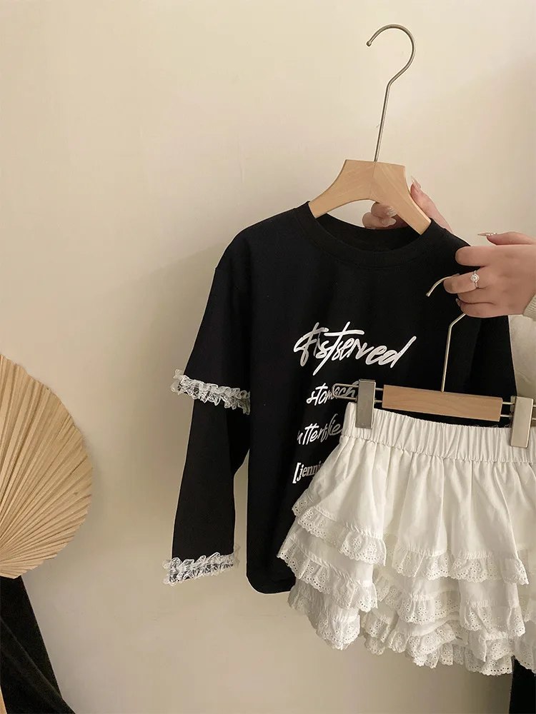 

Girls2025Весенний новый модный кружевной топ с буквами, милая юбка-тортик с кружевной отделкой, комплект из двух предметов