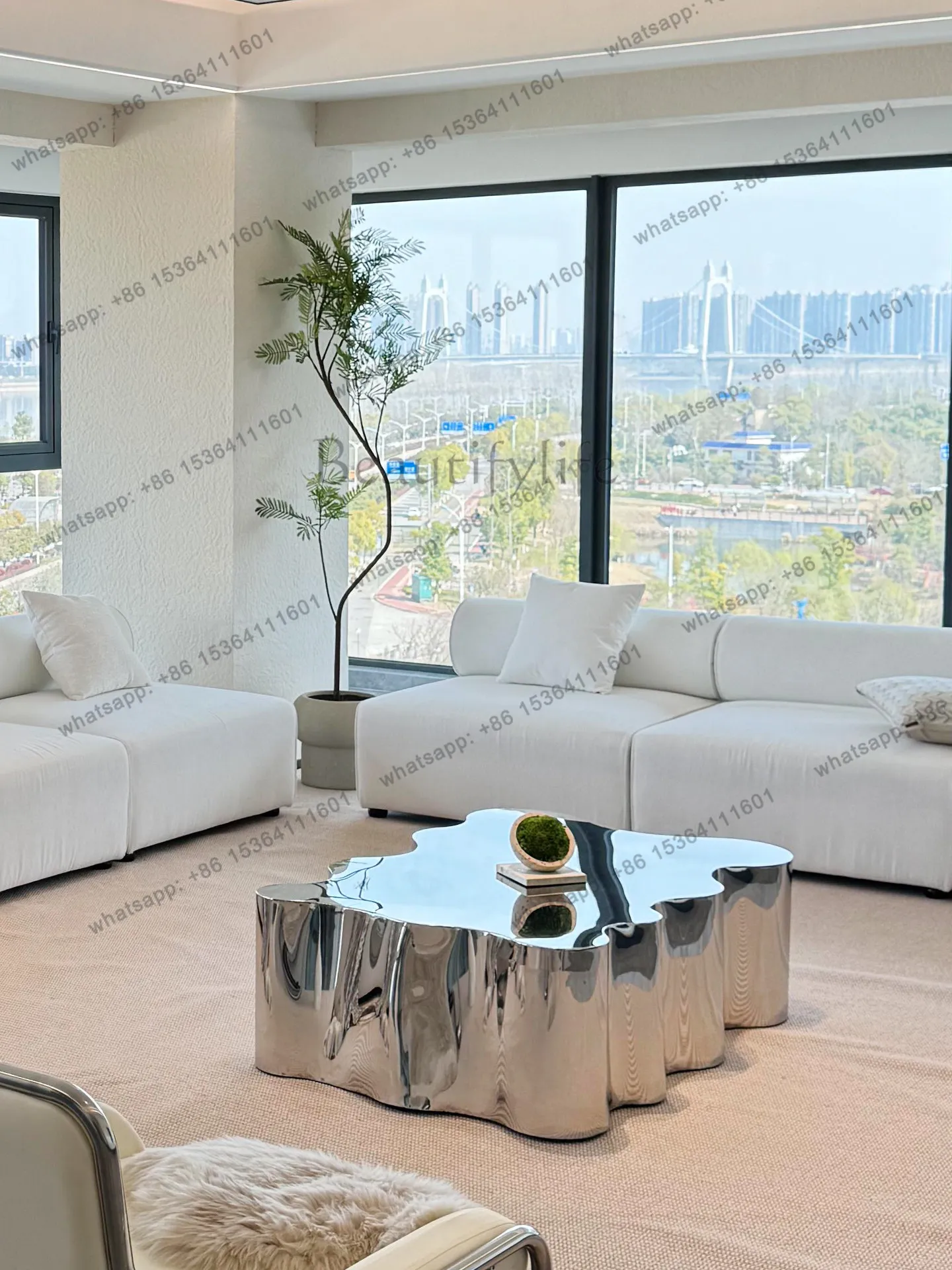 Italian minimalist stainless steel mirror coffee table silver creative special-shaped tea table hotel senior sense irregular