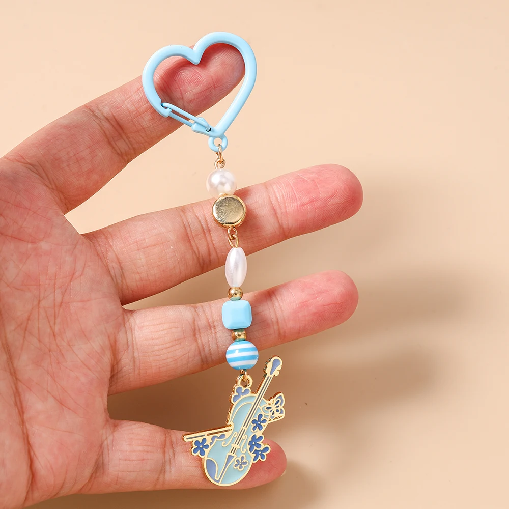Neuer Musikinstrument-Schlüsselanhänger Violine Schlüsselring Anhänger für Frauen Mädchen Handtaschen-Deko DIY Handgemachter Schlüsselanhänger Geschenke – Detail 11