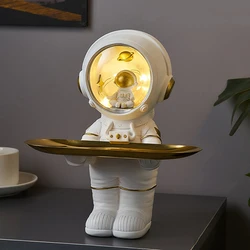 Creativo astronauta statua vassoio di stoccaggio nordico Home Decor scrivania di stoccaggio astronauta figurina soggiorno tavolo arredamento chiave di stoccaggio