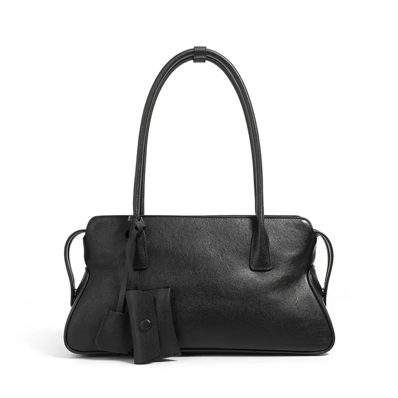 

Retro Trend Single Shoulder Underarm Niche Leather Bag Women's 2026 New Casual Vegetable Tanned Cowhide Portable Pillow Bag