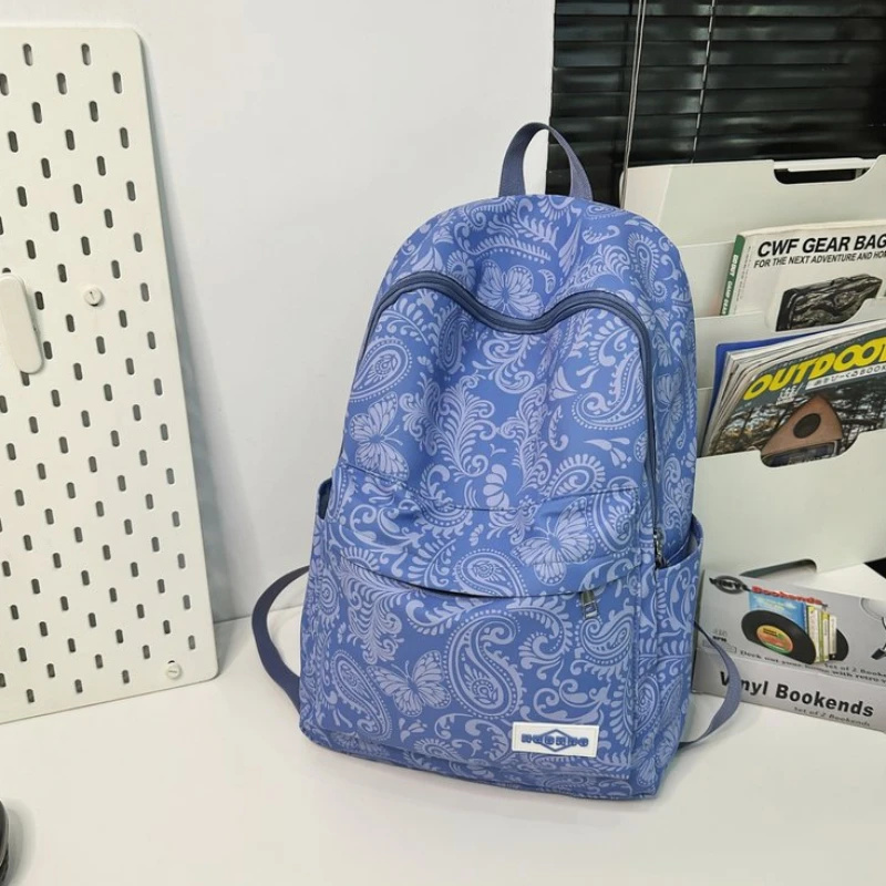 Mochila dulce con estampado personalizado de nailon con cremallera, bolso escolar sencillo e informal para mujer, bolsa de viaje impermeable de gran capacidad 2024