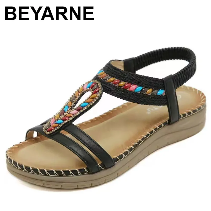 

Новая летняя удобная пляжная обувь в богемном стиле на плоском каблуке, женская обувь с мягкой подошвой, пляжные сандалии, женская нескользящая прогулочная обувь