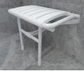 The foldable white ABS shower chair is stylish and suitable for indoor and outdoor use.