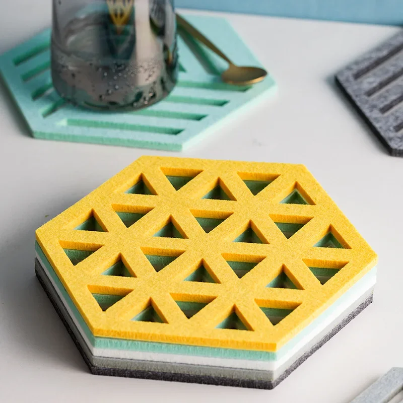 1pcs Creative Felt Coaster Hexagon Hollow Cup Mat Soft Heat Insulated Non Slip Pad Home Hot Drink Holder Desktop Decoration