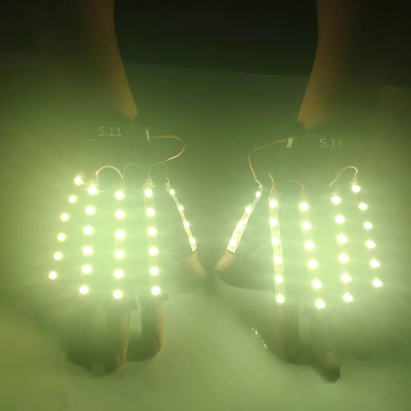 Adult luminous led gloves bars, dance halls and nightclubs perform masquerade parties and Halloween revelry.