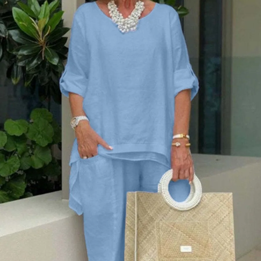 

Пуловер с круглым вырезом и средними рукавами, свободного кроя, однотонный, с карманами, брюки с эластичной талией, комплект из двух предметов, женский костюм для повседневной носки.