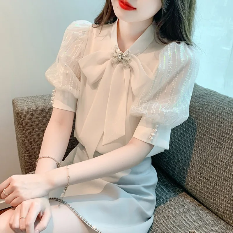 

Faionable Summer Women's Bubble Sve Chiffon irt Beautiful Sli Design Korean Sle Loose Fit Hollow out V-Ne Top