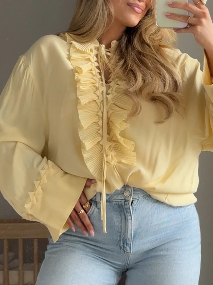 เสื้อผ้าผู้หญิงสไตล์ยุโรปและอเมริกาใหม่แฟชั่นฝรั่งเศสอารมณ์อเนกประสงค์จีบคอวีชีฟองเสื้อแขนยาว