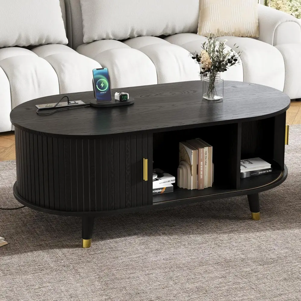 

42.5" Oval Fluted Coffee Table Black Mid-Century Modern with Sliding Tambour Door Built-in Charging Station Solid Wood Legs