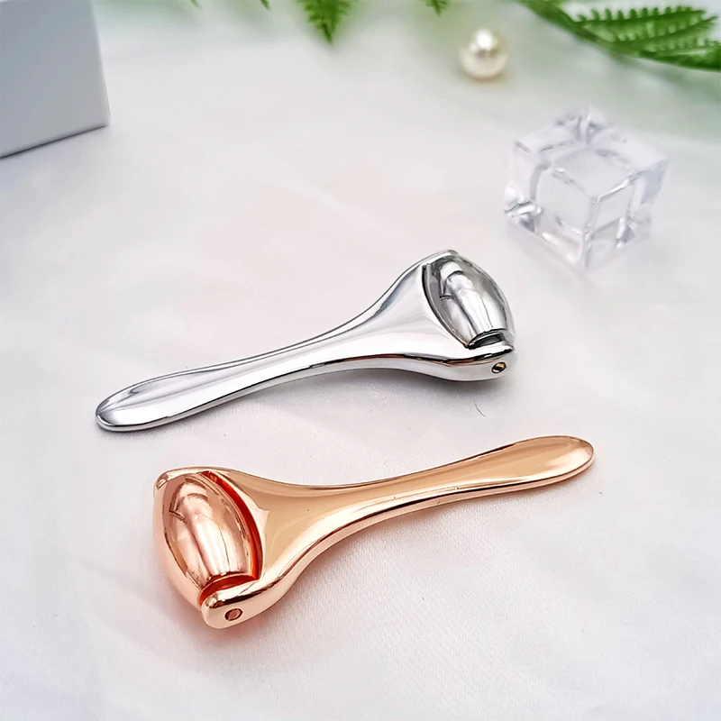New 1PC Metal Cooling Face Roller Skin Cooling Ice Roller Eye Facial Massager Anti-aging Face Lift Pain Relief Beauty Spa Tool