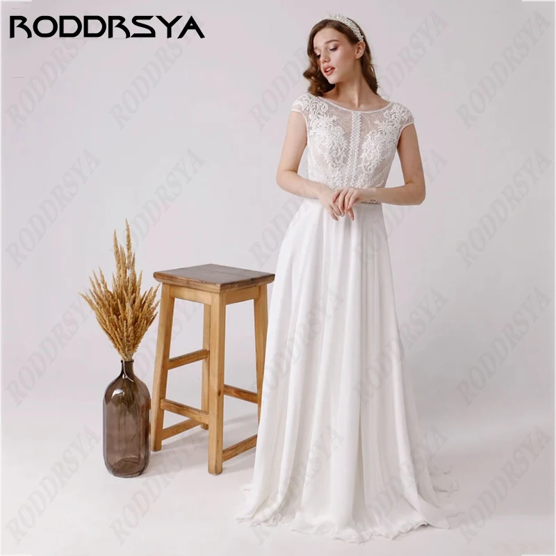 فساتين زفاف من RODDRSYA Boho رومانسية بياقة سكوب بدون ظهر من Vestidos Novia بأكمام بسيطة على شكل حرف a فساتين زفاف لحفلات العروس  رومانسية بياقة سكوب بدون ظهر من Vestidos Novia بأكمام بسيطة على شكل حرف a فساتين زفاف لح