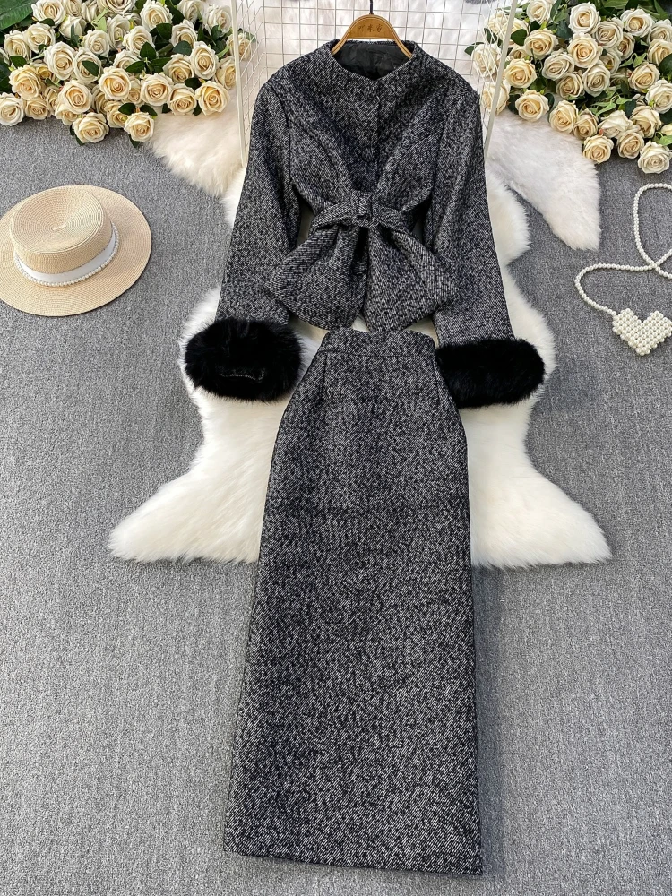 

Толстая шерстяная куртка премиум-класса в американском стиле с затягивающимся талией, тяжелая кожаная куртка с меховыми рукавами, облегающая длинная юбка, комплект из двух предметов