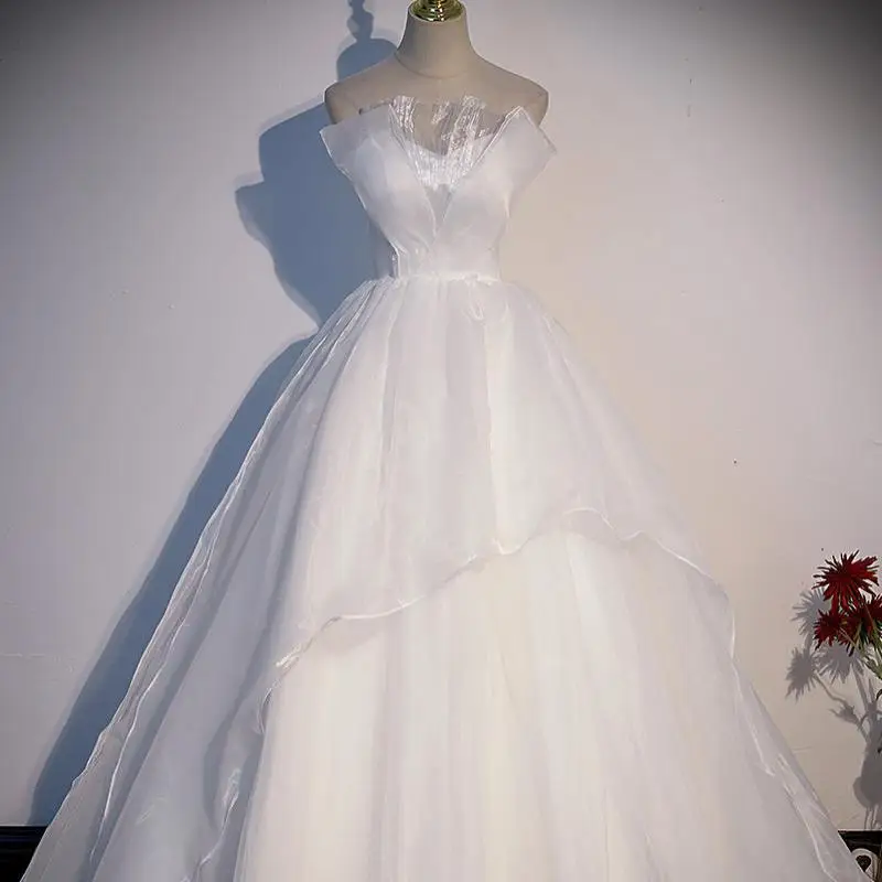 Robes de Quinceanera sans bretelles en tulle, robe de mariée élégante, longueur au sol, mode à plusieurs niveaux, simple, dos nu, nouveau, 2023