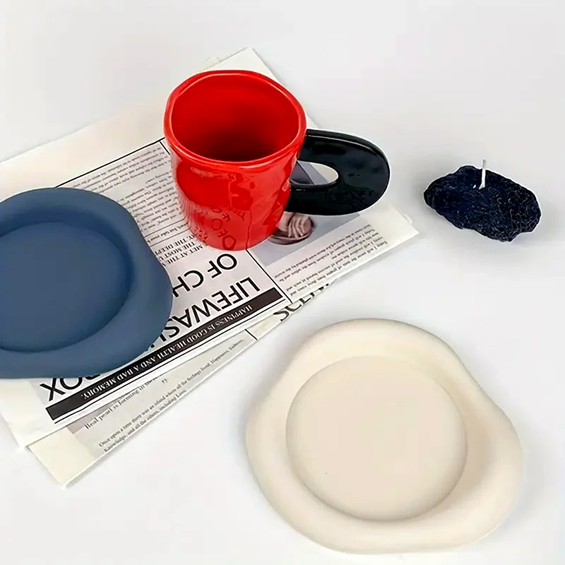 A silicone cloud shaped coaster - Soft and non slip tabletop protection for beverages - Durable, soft, washable beverage mat