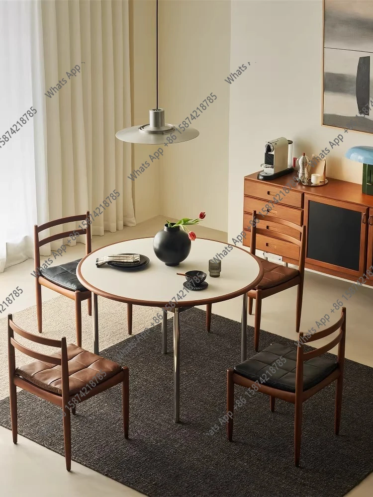 

Wind chime round dining table solid wood slate French retro stainless steel home simple small apartment round designer model