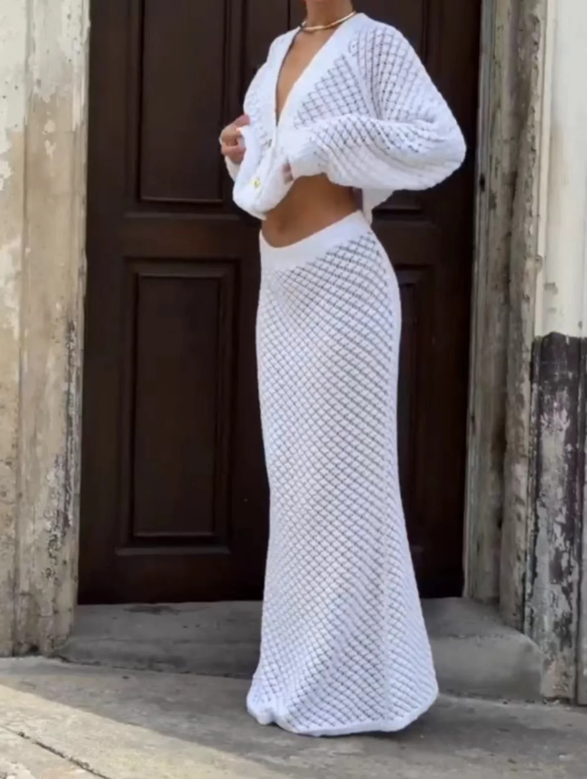 Crochet Hollow White Out Set da 2 pezzi elegante Cardigan corto con scollo a v lavorato a maglia elastico in vita Maxi gonna Set abiti da ritorno a casa 2024