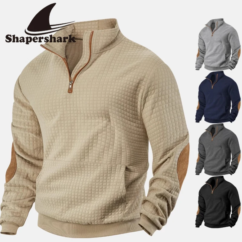 O novo moletom masculino elegante de outono e inverno de manga comprida apresenta um casaco casual e solto com um padrão xadrez