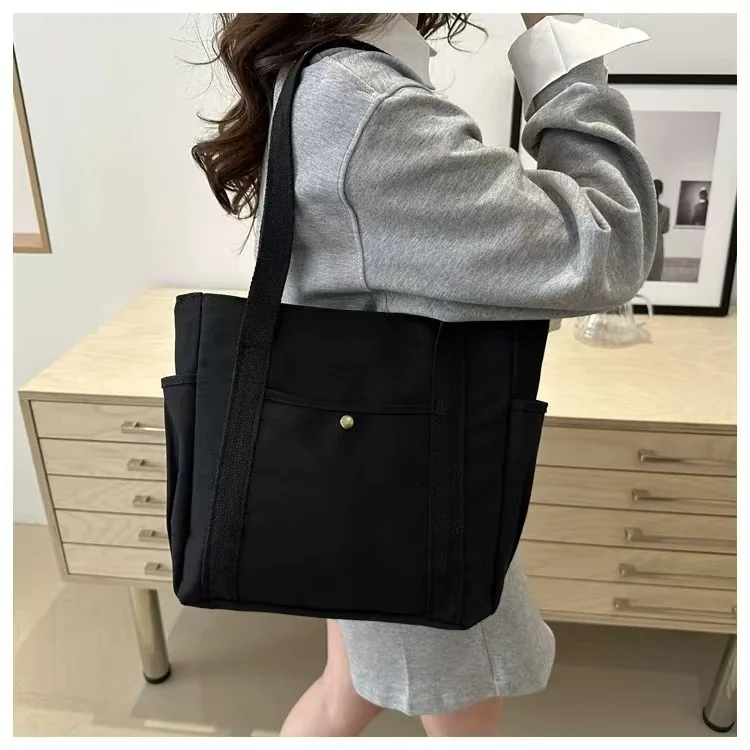 Große Canvas-Tragetasche für Arbeit und Ausgehen, Hochwertige Vielseitige Tasche für Pendler, Literarische und Künstlerische Studentenmode – Detail 9
