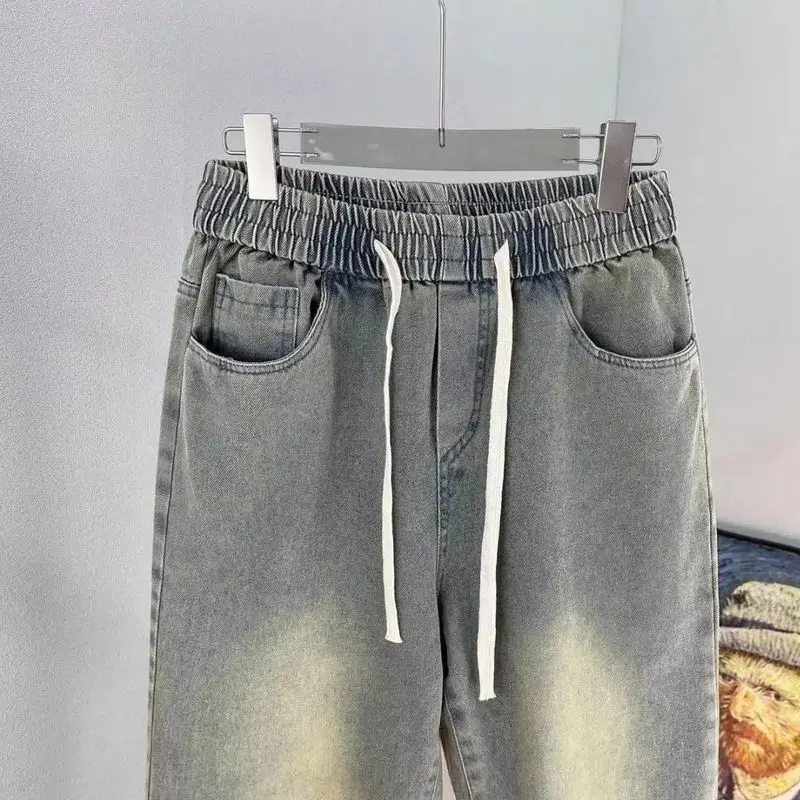 Retro viejo amarillo barro cordón cintura elástica Jeans Cowboys High Street Casual Simple versátil cordón Pantalones rectos