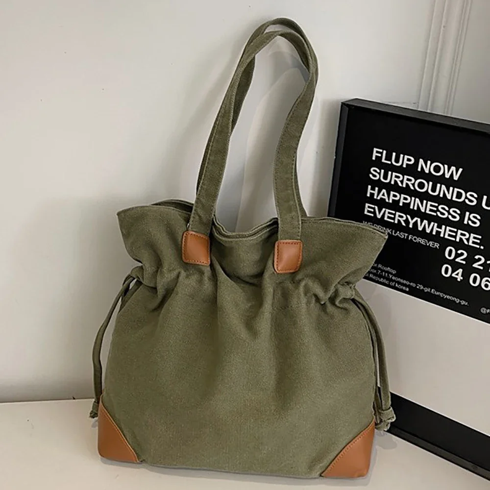 

2025 New Large Capacity Canvas One Shoulder Bag for Women Casual All-Match Zipper Drawstring Bucket Bags Commute Underarm Packs