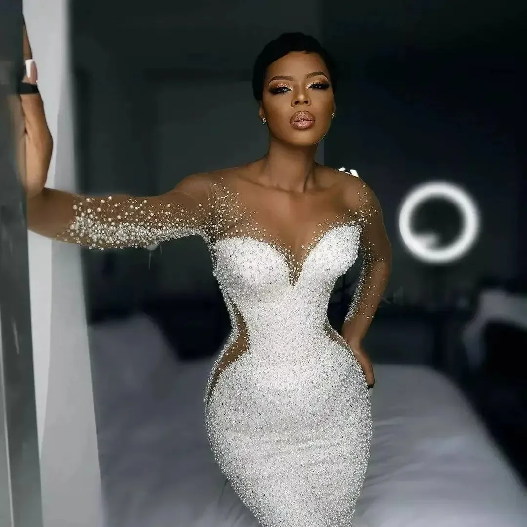 

2026 Sexy Mermaid Wedding Dress Pearls Beads Tulle Bridal Gown with Scoop Illusion Neck And Long Sleeves for Church Wedding