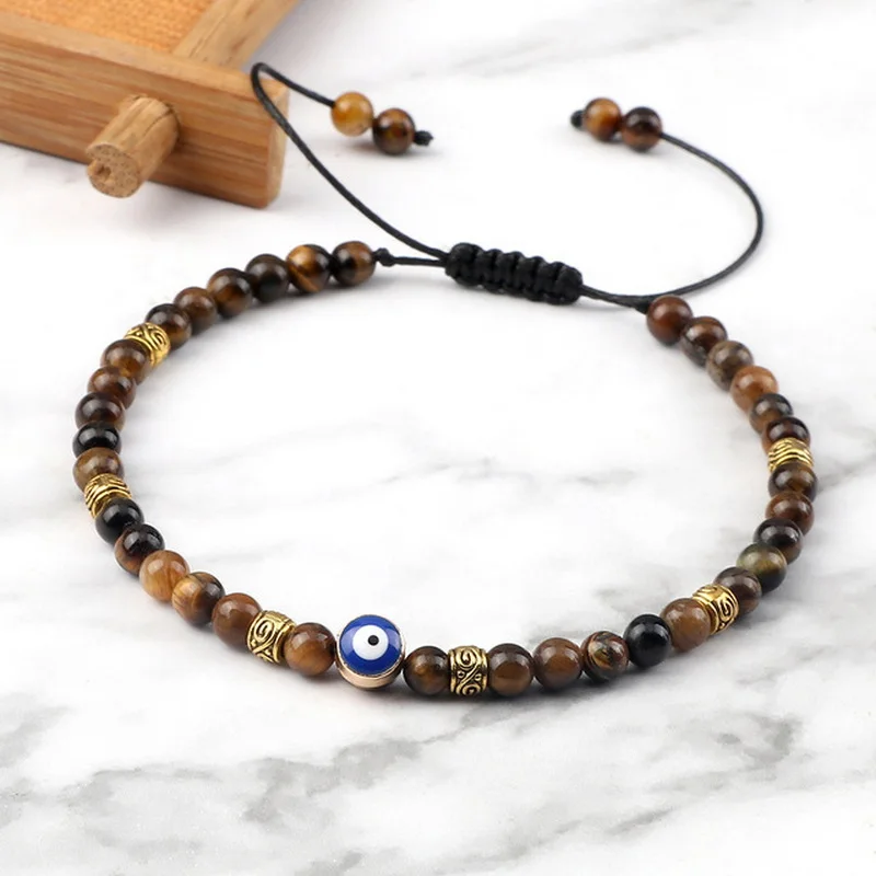 Czarna kamień lawowy bransoletka Evil Eye dla mężczyzn damska pleciona regulowana koraliki w kolorze Tiger Eye bransoletka Yogo moda biżuteria