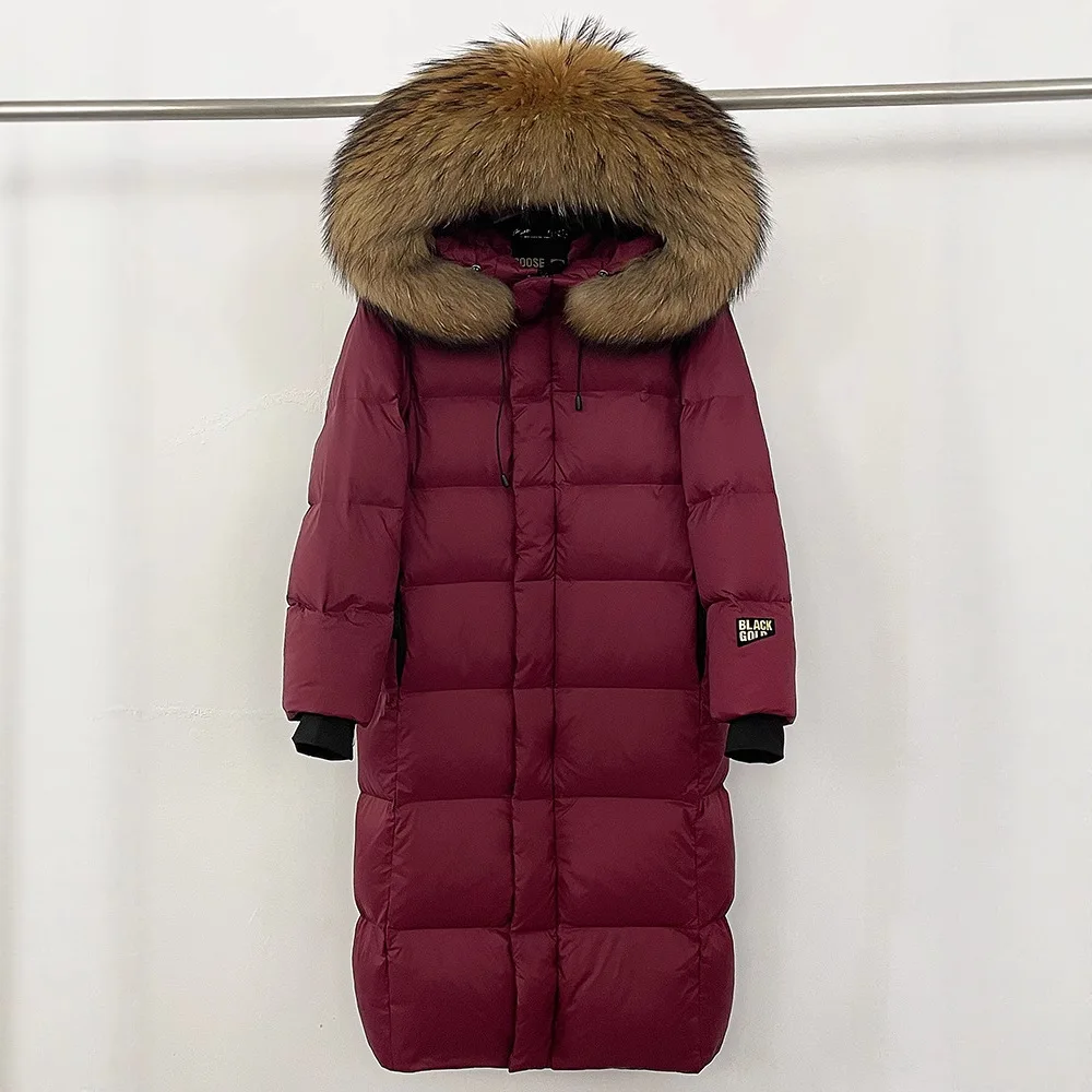 2025 الشتاء موضة أوزة طويلة أسفل سترة فو الفراء طوق مقنعين فضفاضة عادية سميكة الدافئة أسفل معاطف للنساء سترة منفوخة