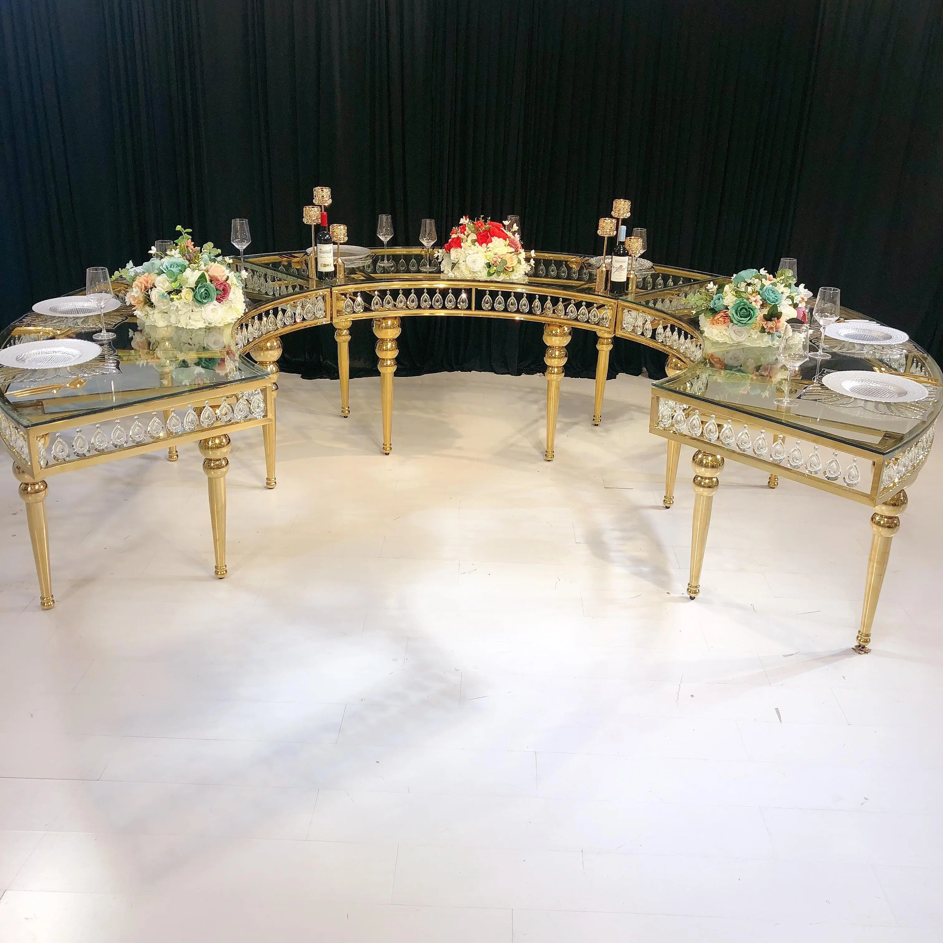 Foshan furniture golden stainless steel leg glass top serpentine wedding table