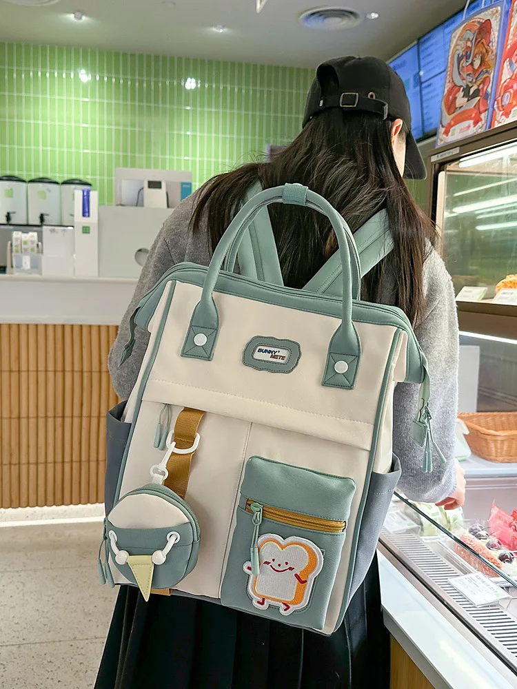 2025 バックパック女性キャンディーカラーのラップトップバックパックかわいいかわいい高校バッグ十代の少女日本旅行キャンプバックパック